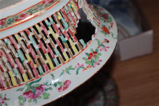 A Chinese famille rose basket and stand and a blue and white bowl, both a.f.